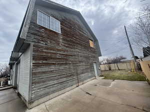 View of property exterior featuring a patio