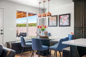 Dining room with light hardwood / wood-style floors