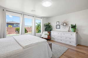 Bedroom featuring light wood-type flooring