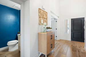 Entryway with light hardwood / wood-style flooring