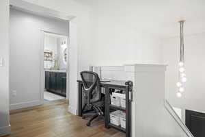 Home office featuring light wood-type flooring