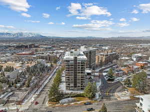 Birds eye view of property with a mountain view