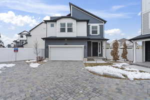 View of front property featuring a garage