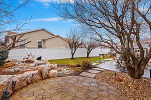 Exterior space with an outdoor structure and a patio