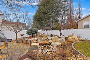 View of yard with a patio area