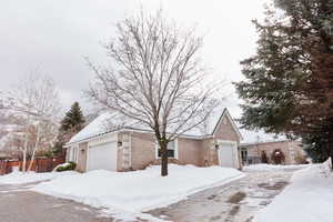 View of front of home featuring a garage