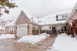 View of front of property featuring a garage