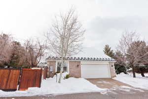 View of front of property featuring a garage