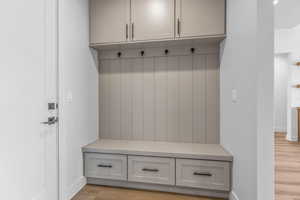 Mudroom featuring light wood-type flooring