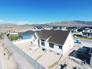 Drone / aerial view with a mountain view and a residential view