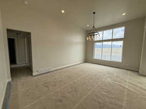 Unfurnished dining area featuring a chandelier, baseboards, visible vents, and recessed lighting