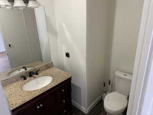 Bathroom with vanity and toilet