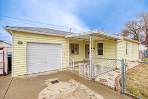 Single story home with a garage