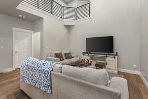 Living room featuring hardwood / wood-style flooring