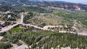 Birds eye view of property featuring a mountain view