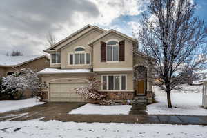 View of front property with a garage