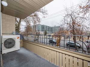 Balcony featuring ac unit