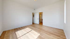 Empty room featuring light hardwood / wood-style floors