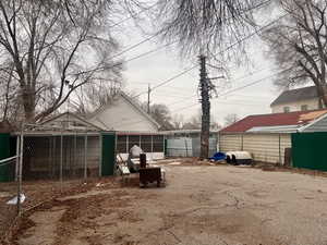 View of yard featuring a sunroom