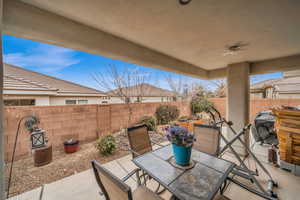 View of patio featuring ceiling fan