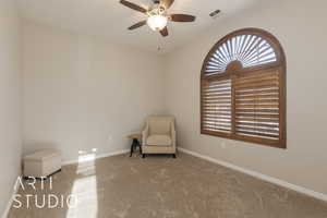 bedroom 3 with ceiling fan and carpet flooring