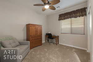 bedroom 2 with a ceiling fan and light