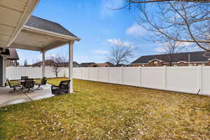 View of yard with a patio