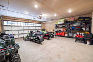 Garage featuring a garage door opener