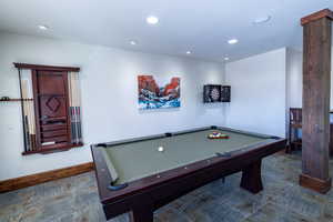 Game room featuring billiards