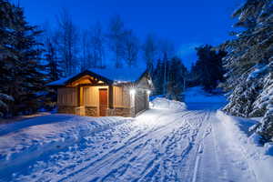 View of snow covered property