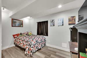 Bedroom with light wood-type flooring