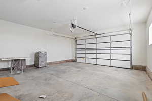 Garage featuring a garage door opener