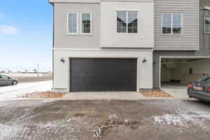 View of front of property with a garage