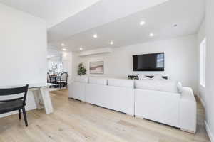 Living room with light wood-type flooring