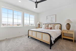 Bedroom with carpet and ceiling fan