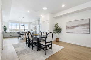 Dining space featuring light wood-type flooring