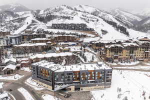 Snowy aerial view with a mountain view