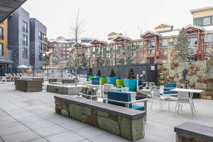 View of patio / terrace featuring an outdoor living space with a fire pit