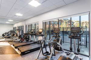 Workout area with a paneled ceiling