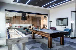 Game room featuring carpet flooring and billiards