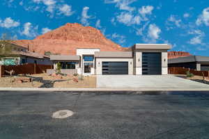 Contemporary house with a garage and a mountain view