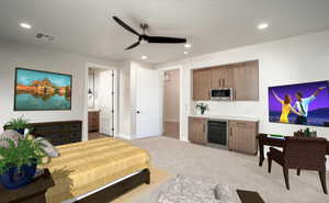 Bedroom with ceiling fan, beverage cooler, and light colored carpet