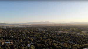 Aerial view at dusk featuring a mountain view