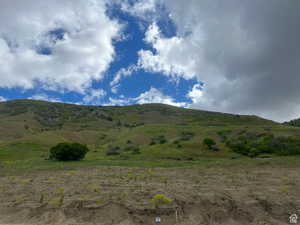 Property view of mountains featuring a rural view