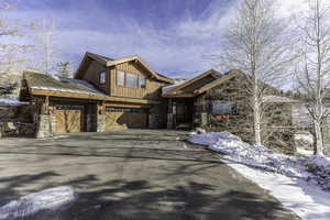 View of front of home featuring a garage