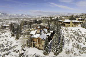 Snowy aerial view with a mountain view