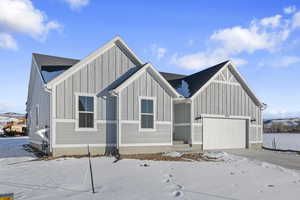 View of front of house featuring a garage