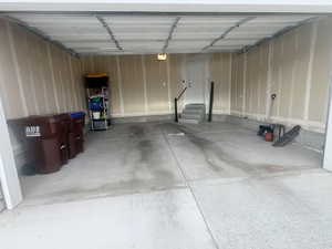 Garage featuring a garage door opener