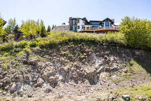 View of yard with a wooden deck