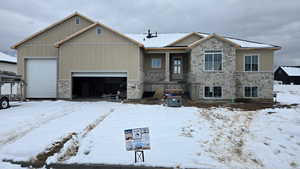 View of front of home with a garage